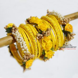 All yellow bangle set with flower embellishment